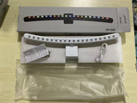 A hanging light on the computer monitor