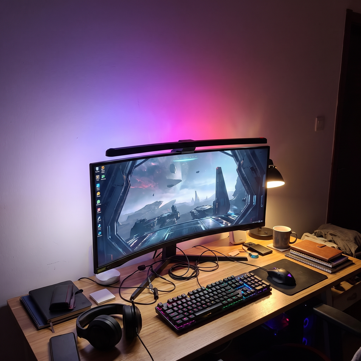 A hanging light on the computer monitor
